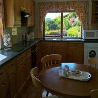 Oak fitted kitchen with dual aspect and beautiful views of Mid Wales.