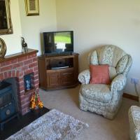 Comfortable family lounge at Drainbyrion Farm Self Catering.